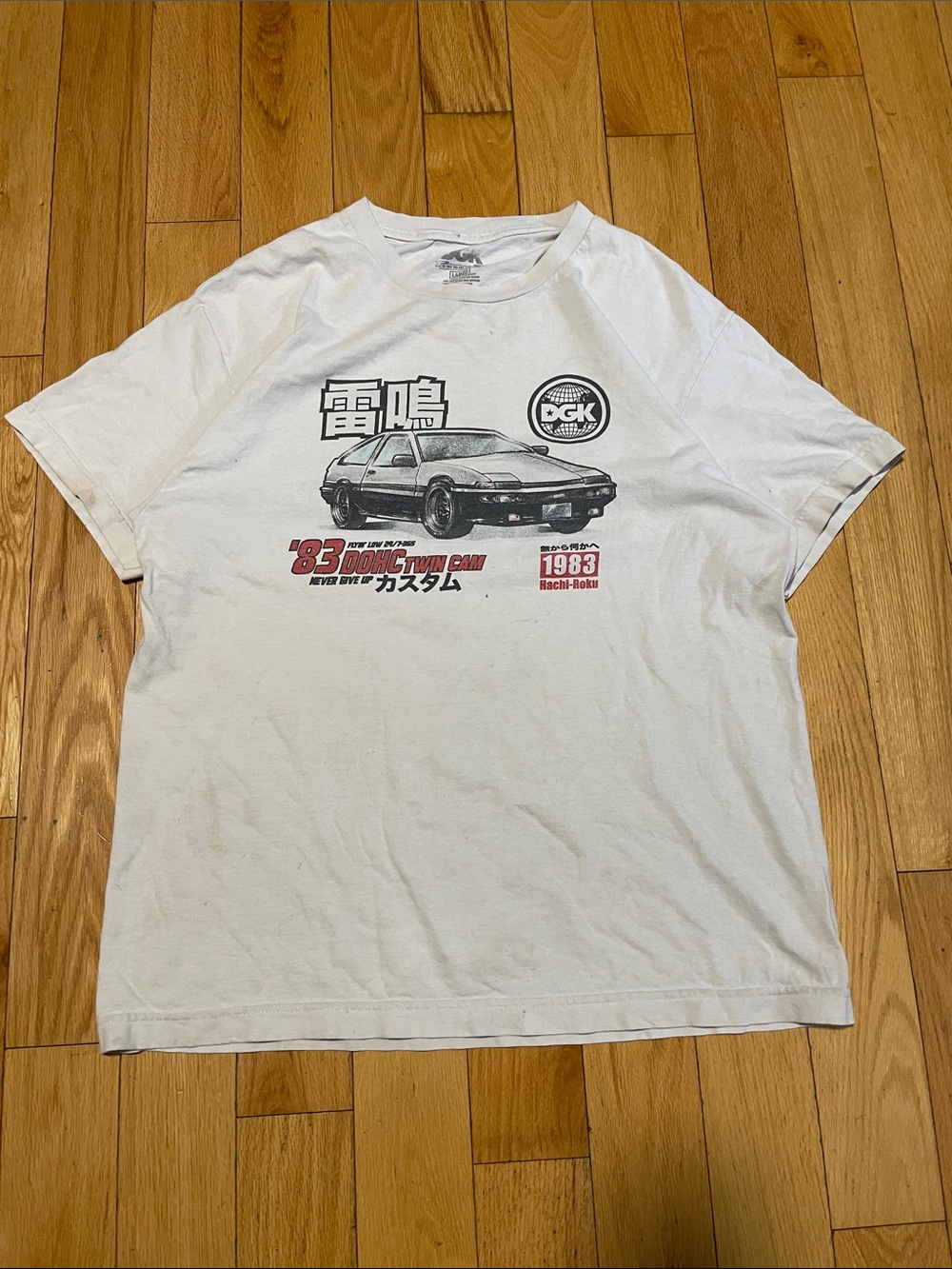 DGK White Short Sleeve Tee with Black & Red Car Graphic
